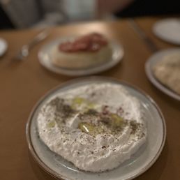 Othello's signature dishes Whipped FetaLamb ShankSeared Octopus